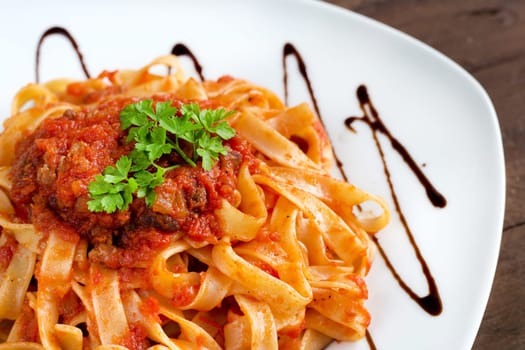 Tagliatelle with wild boar ragu made in italian style