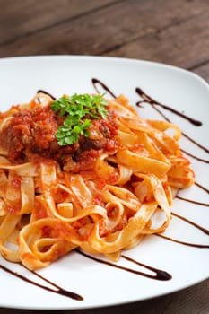 Tagliatelle with wild boar ragu made in italian style