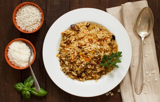 Risotto with vegetables and spices close up