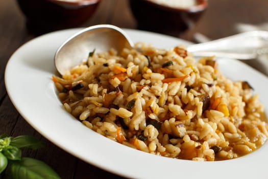 Risotto with vegetables and spices close up