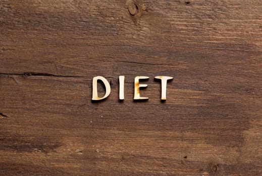 The word of Diet on wooden background