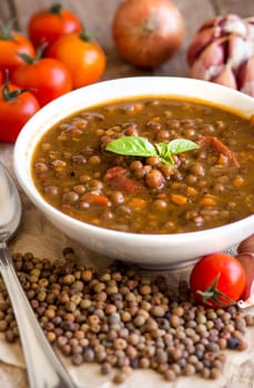 Cooked roveja stew with cherry tomatoes, garlic and onion