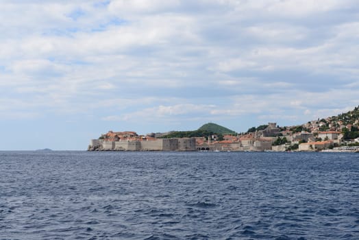 View of Dubrovnik old town from Adriatic sea (Croatia). Space for text up and button.