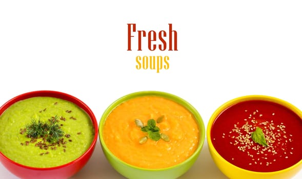 Three fresh soups - tomatoe, pumpkin and green peas soups