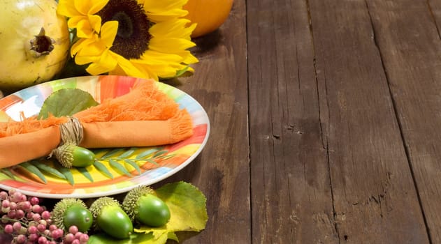 Rustic autumn table setting on a wooden table