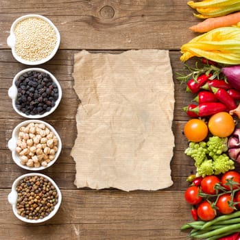 Cereals, legumes and vegetables on a wooden table