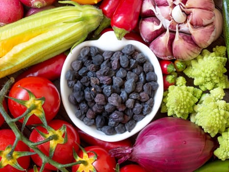 Black chickpea in a bowl with vegetables