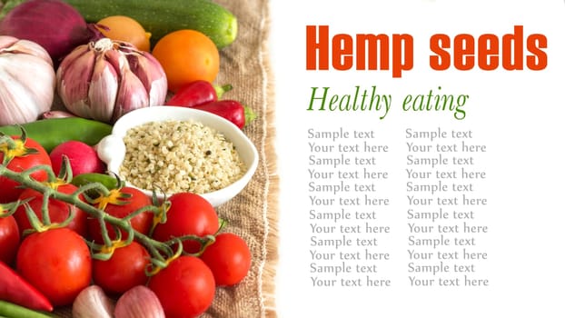 Raw organic hemp seeds in a bowl and vegetables