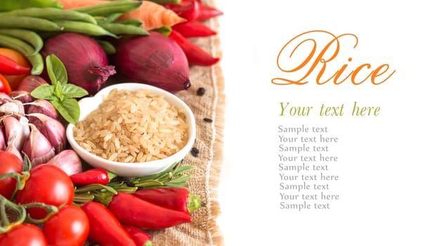 Whole upolished organic rice in bowl and vegetables