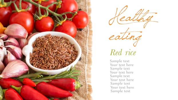 Red organic rice in bowl and vegetables