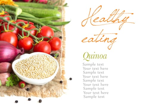 Raw organic quinoa in a bowl and vegetables