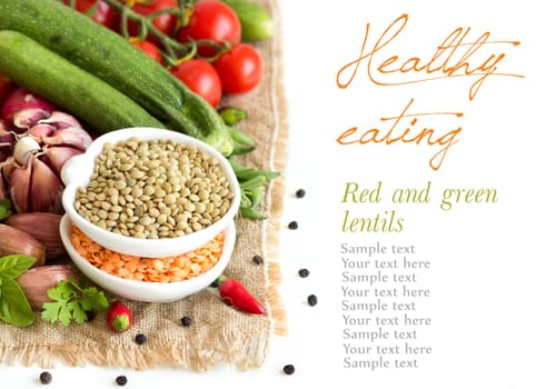 Red and green lentils and vegetables isolated on white