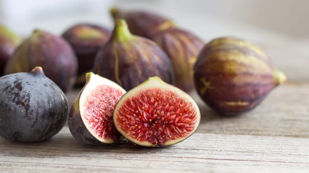 Fresh fruits - figs on the wooden table