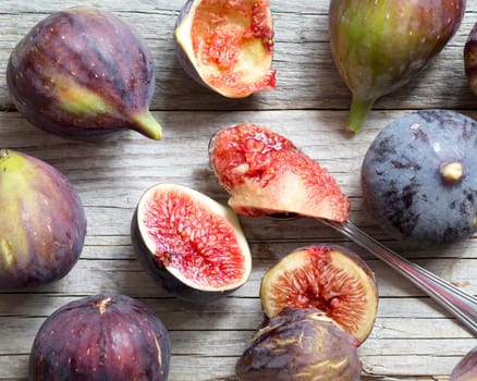 Fresh fruits - figs on the wooden table