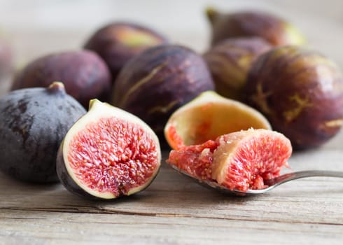 Fresh fruits - figs on the wooden table