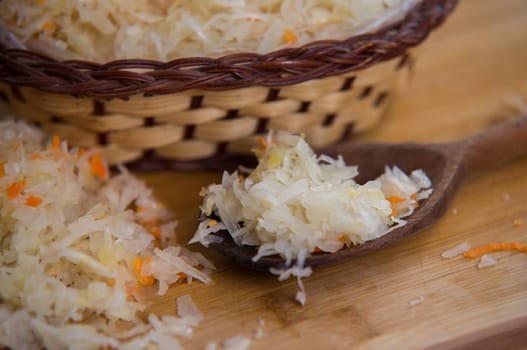 sauerkraut close up on a wooden plate