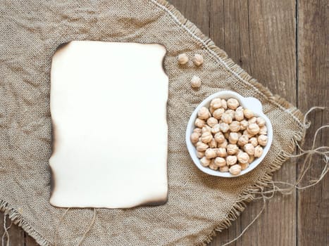 Raw Organic chickpea in a bowl on wooden table