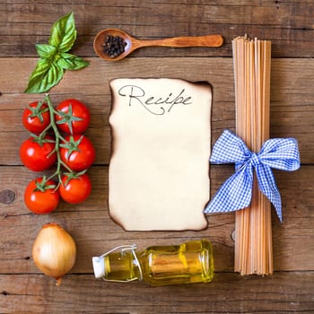 Ingridients for pasta with tomato sauce - tomatoes, onion, basil, extra vergin olive oil, pepper and whole durum spaghetti