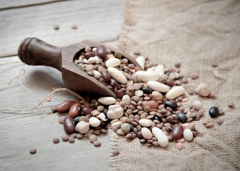 Legumes mix in the wood spoon