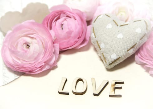 Ranunculus flowers, heart and letters LOVE
