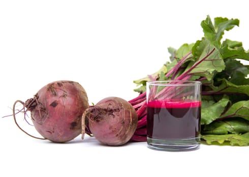 Fresh juice of red beets on white