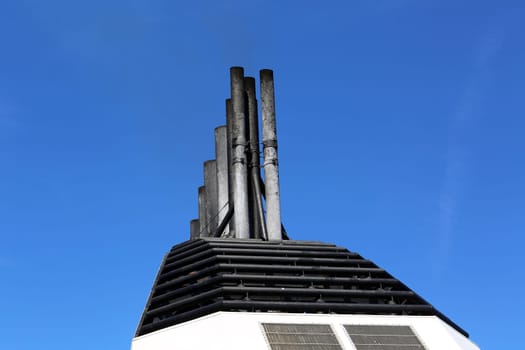 Big Chimney Of A Ferry Against A Blue Sky.