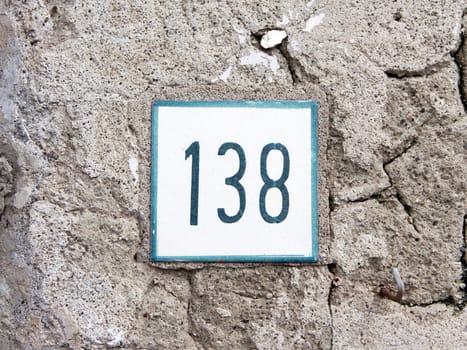 Number 138 on old wall
