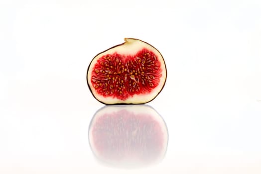 fresh figs isolated on white with reflection