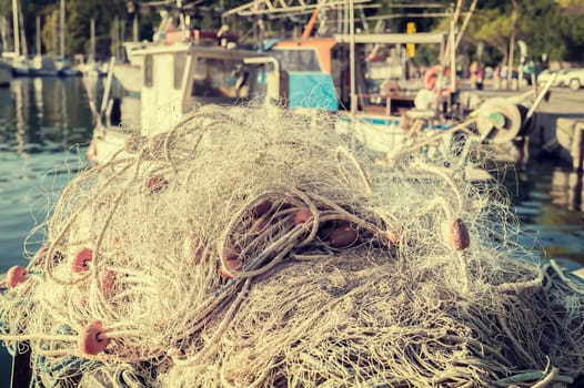 Fishing net drying in the sun. Photo in styles vintage