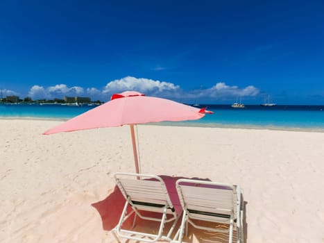 The tropical beach, Barbados, Caribbean with blue water