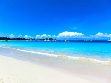 The tropical beach, Barbados, Caribbean with blue water