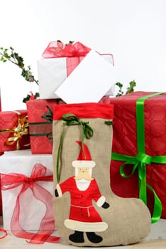 the Christmas gift boxes with boot of Santa Claus