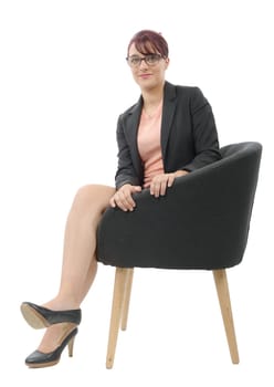 a young businesswoman sitting in a chair