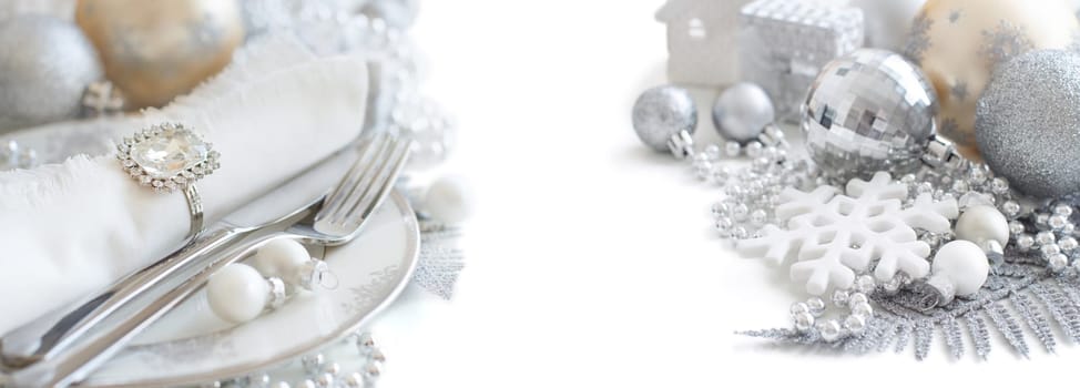 Silver and cream Christmas Table Setting with christmas decorations