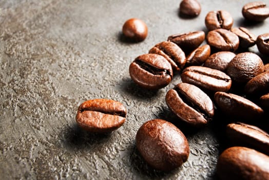 Coffee beans on a grunge background close up