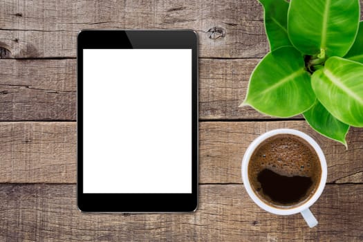 digital tablet on wood table top view, tablet white screen for adjust app screen