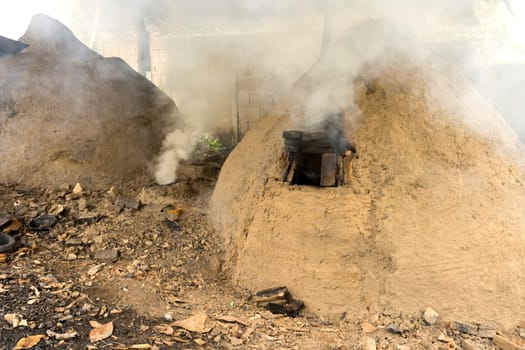 native charcoal incinerator in countryside of thailand