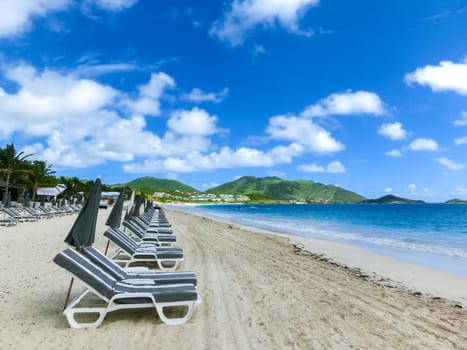 The chairs and umbrellas on Caribbean tropical beach