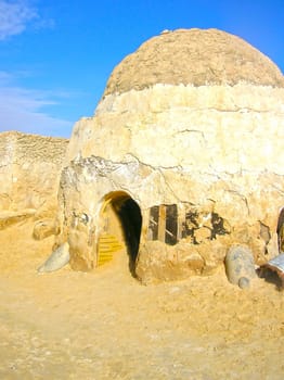 Sahara, Tunisia - January 03, 2008: Abandoned sets for the shooting of the movie Star Wars in the Sahara desert on a background of sand dunes in Sahara, Tunisia