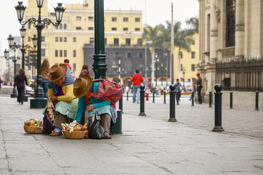 Peruvian Women Selling Sweets in the Streets of Lima, Peru.