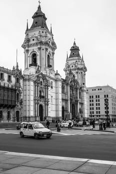 City Life in Front of The Basilica Cathedral at the Plaza Mayor in Lima, Peru.