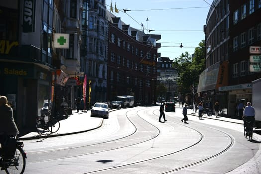 Bremen,Germany - August 30,2016: Röder Straße in downtown Bremen with tram tracks,passers-by and shops on August 30,2016 in Bremen.