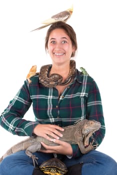 Girl with several pet animals isolated in white