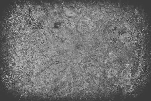 bright black scratched grunge wall background or texture