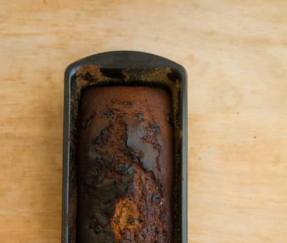 clos up on burned gingerbread on wood table