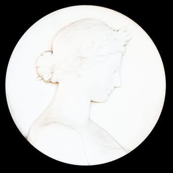Antique cameo with ladies face. Black background