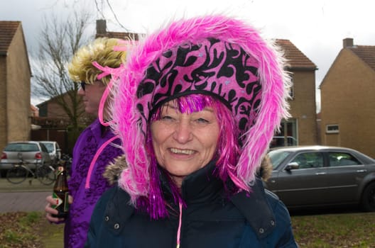OLDENZAAL, NETHERLANDS - FEBRUARY 7, 2016: Unknown person in funny carnival dress during the annual carnival parade
