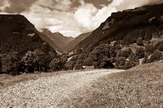 Swiss Alps - snow capped mountains and deep valleys, stunning view, breath-taking panorama
