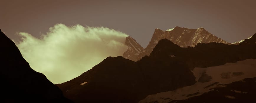 Swiss Alps - snow capped mountains and deep valleys, stunning view, breath-taking panorama