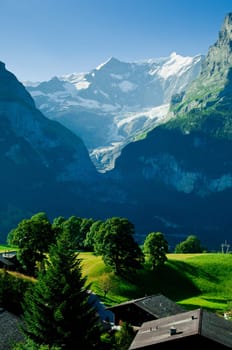Swiss Alps - snow capped mountains and deep valleys, stunning view, breath-taking panorama